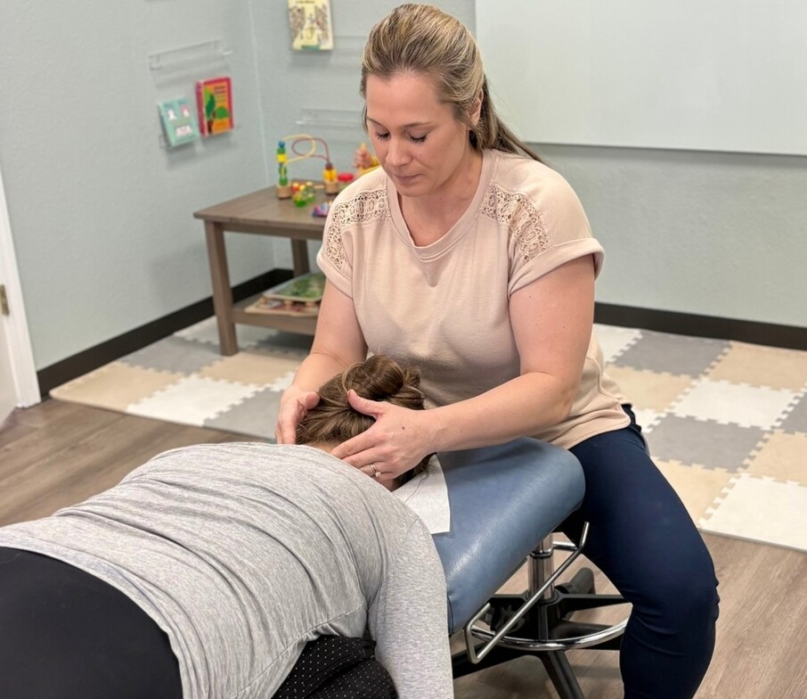 Dr. Nelson performs cranial sacral work on a prenatal patient